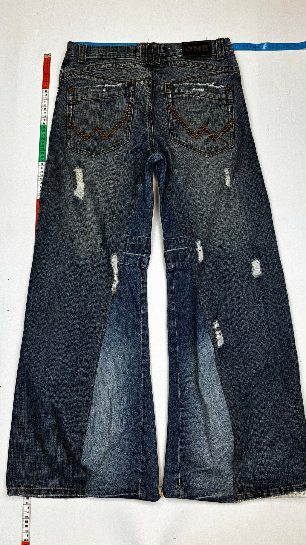 Distressed flared jeans