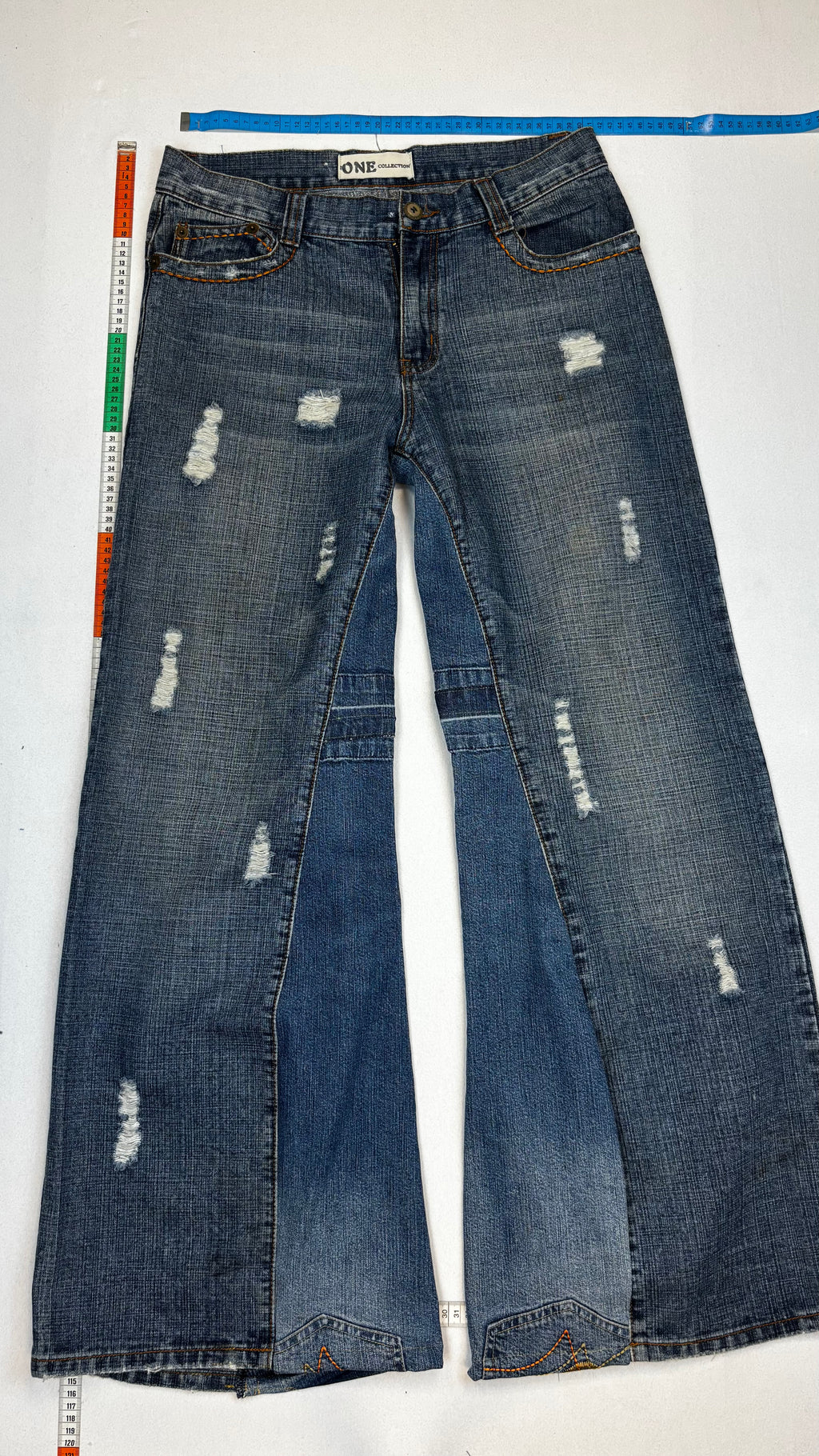 Distressed flared jeans